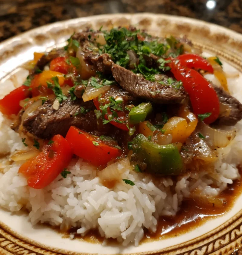 Pepper steak over rice